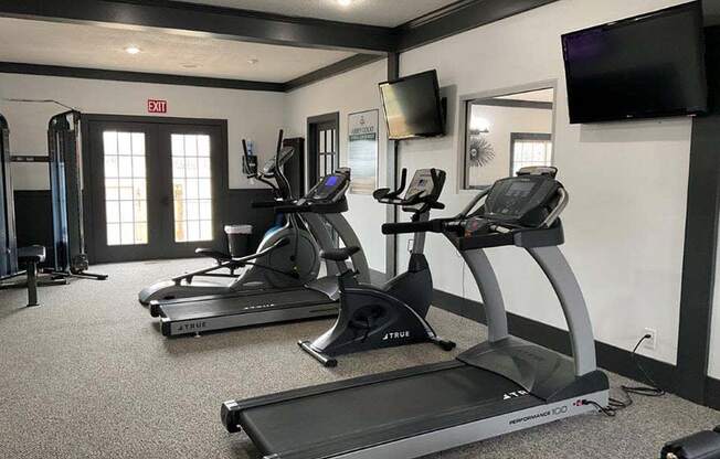 fitness center at abbey court with treadmill