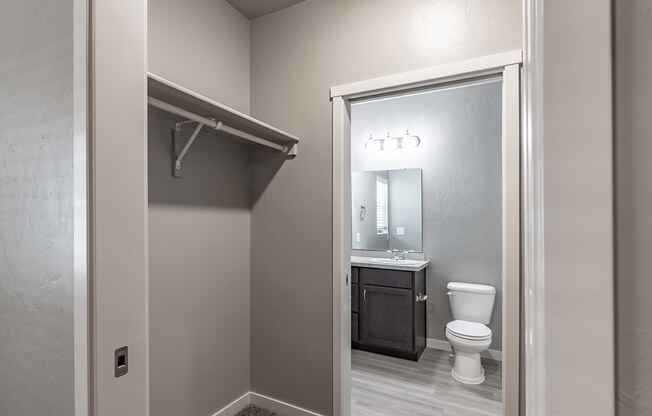 a bathroom with a toilet and a sink