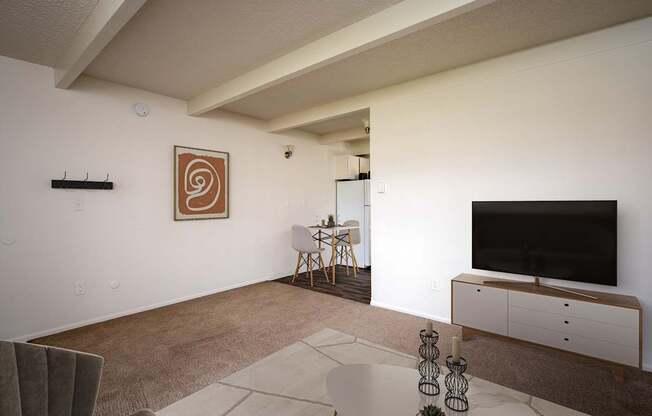 A living room with a television and a chair.