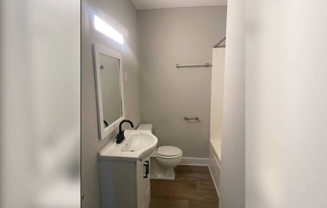 a small bathroom with a sink and a toilet