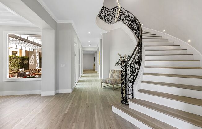 Welcome to 508 Westminster Avenue—a refined blend of Mediterranean charm, modern farmhouse elegance, and classic Newport Beach luxury, tucked away on a quiet, tree-lined street in one of the area’s most coveted neighborhoods.