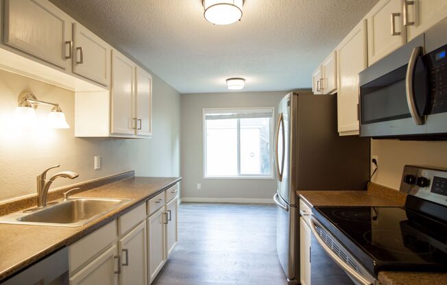 Get $500 OFF! Fabulous Totally Renovated 3 Bedroom with W/D, A/C, D/W, Parking, Etc!!