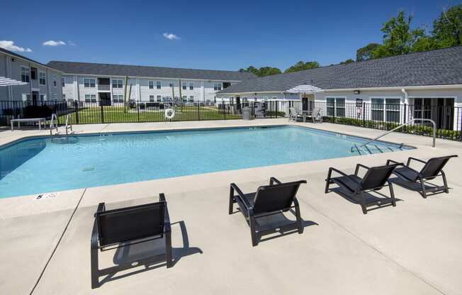 our apartments have a resort style pool with lounge chairs