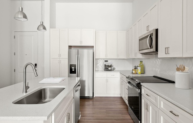 The Helmsman - Spacious Designer Kitchen with Quartz Counters, Upgraded Appliances and Herringbone Backsplash
