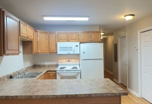 Bright, roomy unit available August 01st!  Convenient location at a great price - $3150/month includes 2 assigned Parking Spaces!