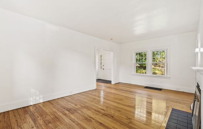 Tastefully Updated 3 Bed, 2 Bath Home - 2 Stall Garage, Spacious Level Yard - Available Now in Forest Hills!