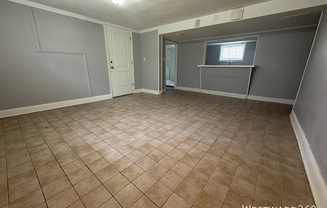 9150 S COLFAX AVE