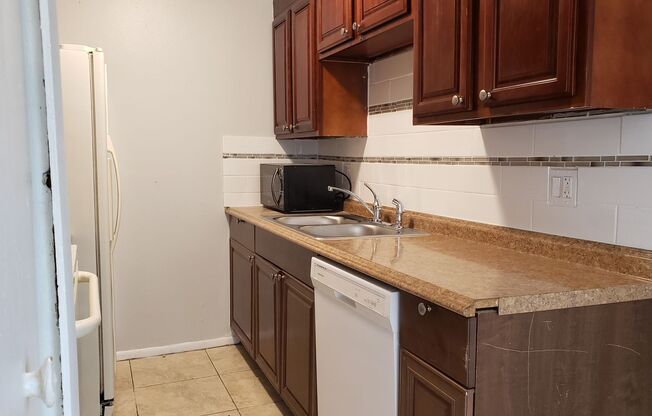 2 BR / 2 BA Condo with Attached Garage and Yard