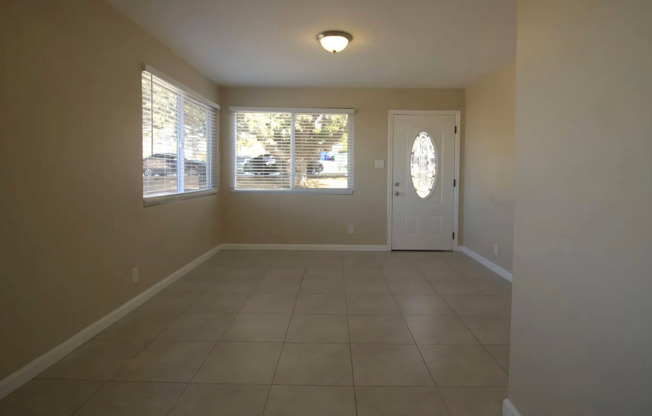 JUST LISTED 2-Bedroom Home with  In-Unit Laundry & Two Designated Parking Spots