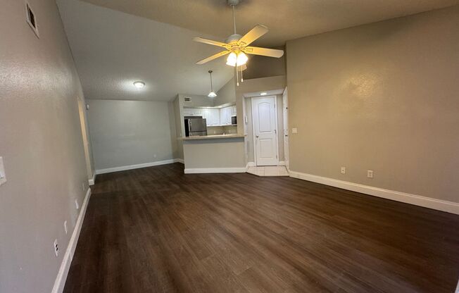 Spacious third floor unit located in the gated community of Venetian place