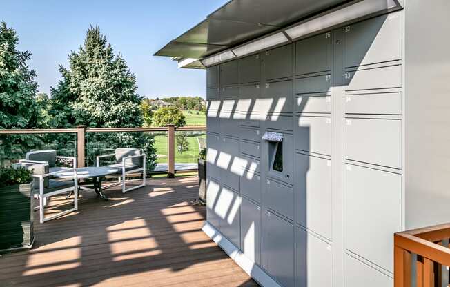 Terrace lounge with package receiving at Tiburon View Apartments, Nebraska