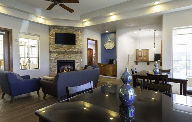 Clubroom With Smart Tv And Fireplace at Canyon Ridge Apartments, Arizona
