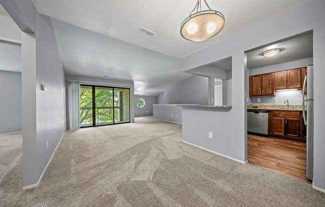 A spacious living room with open floor layout at Park Lane Apartments in Southfield