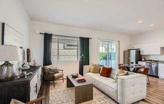 Living room and kitchen with wood flooring at Hampton Meridian, Apache Junction, 85120
