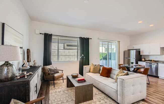 Living room and kitchen with wood flooring at Hampton Meridian, Apache Junction, 85120