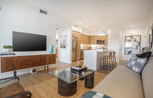 a living room with a couch and a tv