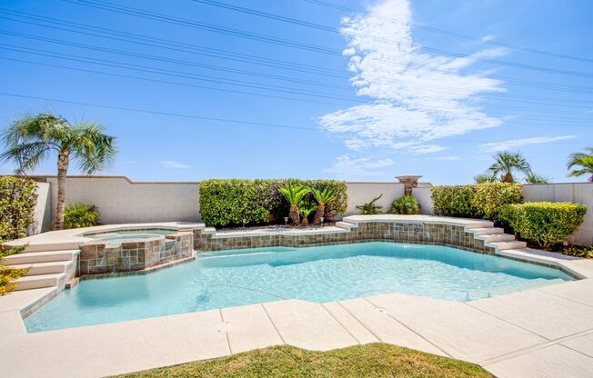 4 Bed 3 Bath Beautiful Home With STRIP VIEWS & POOL/SPA! Located in the heart of Summerlin.