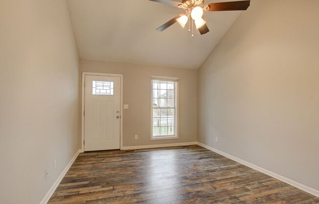 Quaint Ranch Style Home With Hardwood Flooring and Stainless Steel Appliances