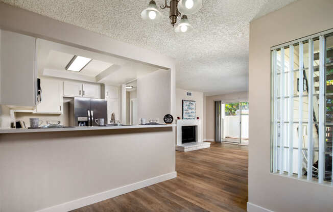 Dining room near kitchen with hardwood flooring