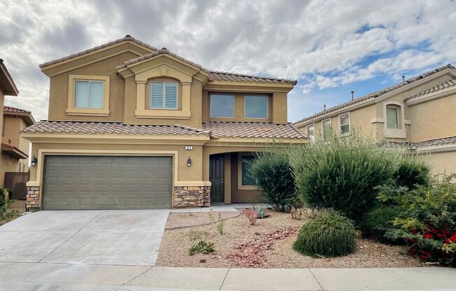 Stunning golf course view! Beautiful home is located on golf course inside Rhodes Ranch guard gated community! Master bedroom is downstairs!