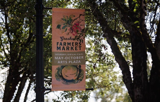 Springwater Crossing exterior farmers market sign