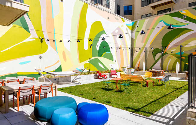 A colorful mural on the wall of a building.