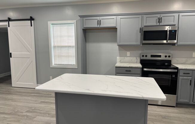 Fully renovated 3 bedroom 2 bathroom house!   Lawn Care Included