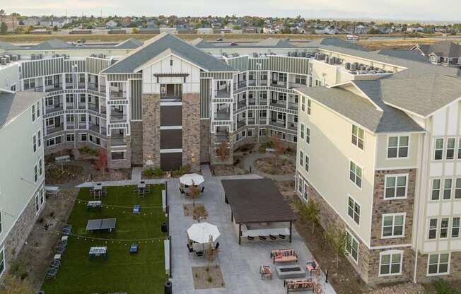 A large apartment complex with a courtyard in the middle.