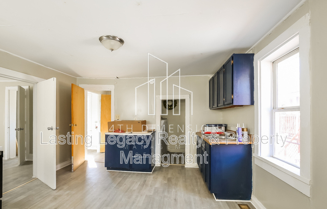 438 W 24 ST