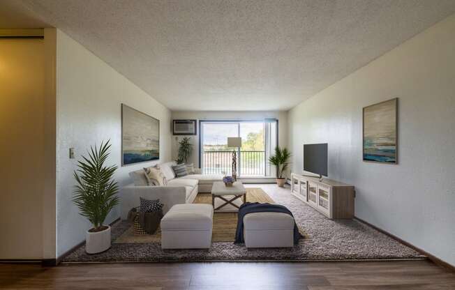 Living Room With Balcony at Pheasant Park Apartments, New Hope, 55428-5401