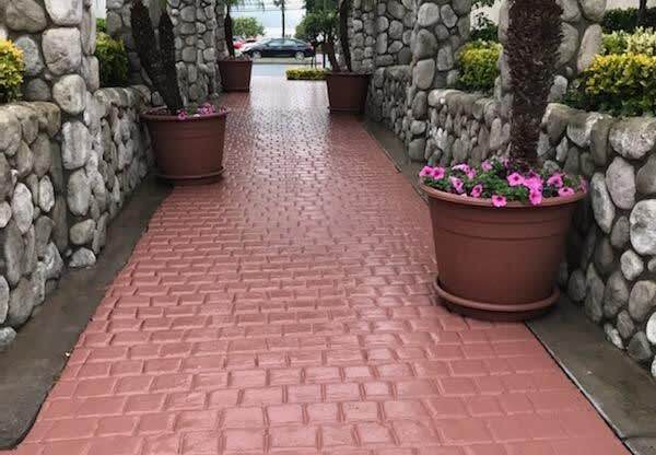 Elegant resort style enterance to Northwood Apartments in Upland, California.