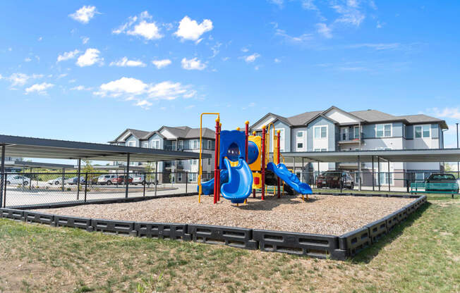 the playground at the whispering winds apartments in pearland, tx  at Union at Wiley, Iowa, 52404