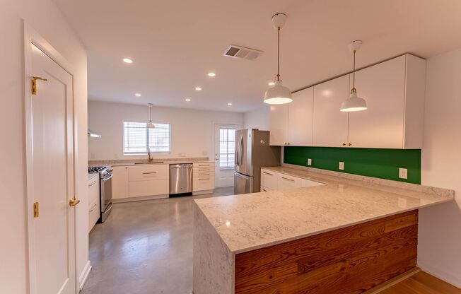 Renovated Brentwood Gem: Modern 3-Bed, 2-Bath Home with Office, Sunroom, and Spacious Yard!