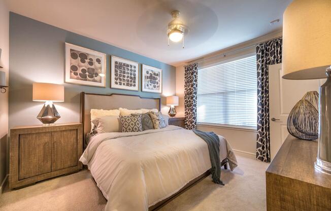 a bedroom with a large bed in a hotel room