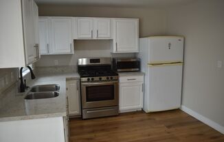 Detached 1 Bedroom Home with Large Private Backyard