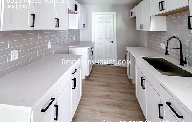 6615 MOSS ROSE ST