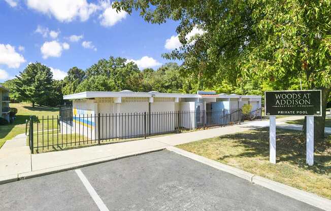 A private pool is located at Woods at Addison.