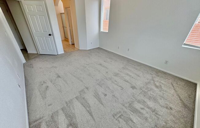 SPACIOUS 3 BEDROOM, 3 BATH RENTAL HOME IN SOUTHSTAR AT THE RIDGES TWO-STORY RESIDENCE FEATURING A FIRST-FLOOR GUEST SUITE WITH FULL BATH—PERFECT FOR VISITORS OR HOME OFFICE