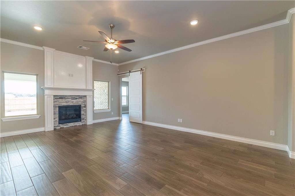 4 Bedroom, 3.5 Bathroom Home in East Edmond with Study, 3 Car Garage and Storm Shelter
