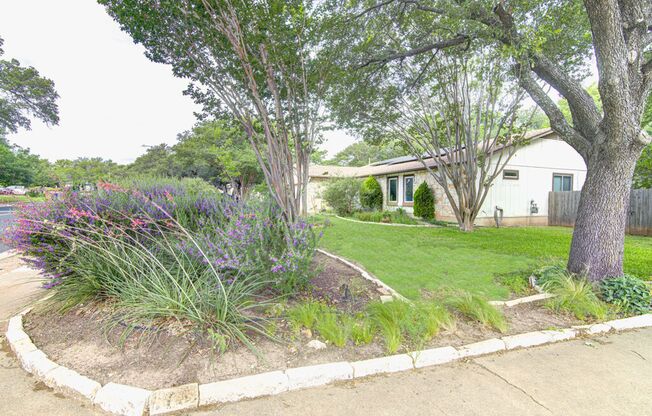Freshly Updated 4 Bed Home with Solar Panels & Incredible Native Landscaping