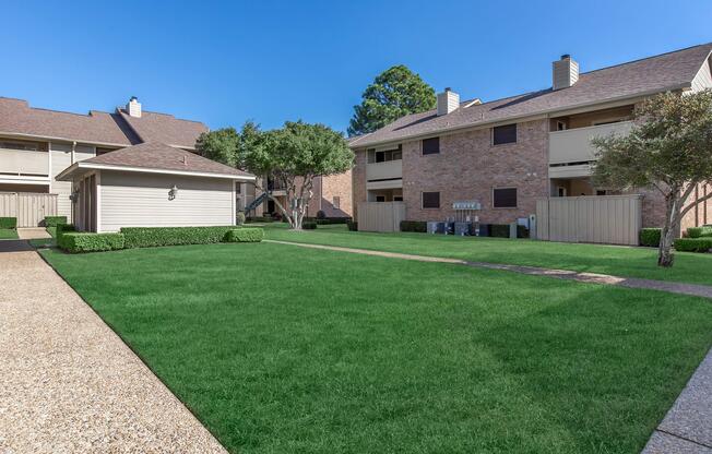 a large lawn in front of a house