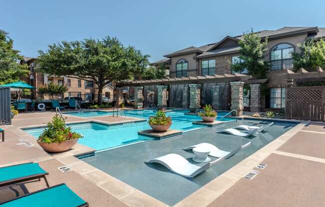 our apartments have a large swimming pool with lounge chairs