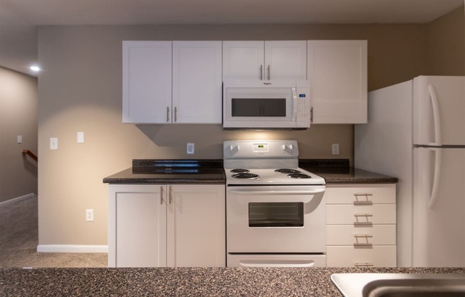 This is a photo of the kitchen in the 1170 square foot 2 bedroom, 2 bath Freedom Balcony at Washington Place Apartments in Miamisburg, Ohio in Washington Township.