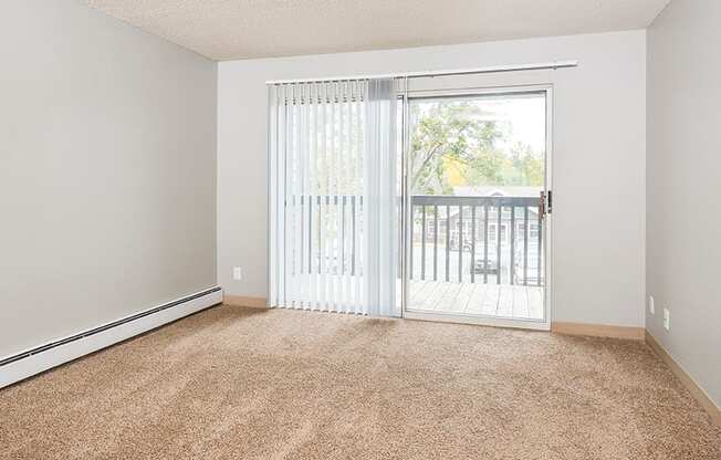 Spacious Living Area with Plush Carpeting