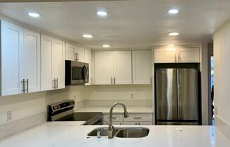 Beautiful finishes, MUST SEE! Renovated 1 bedroom condo in La Jolla Park Villas! Includes 1 COVERED PARKING SPACE! IN UNIT WASHER & DRYER! Plenty of storage space!