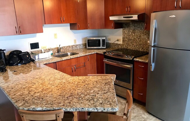 Nicely furnished two bedroom two bath Condo in Harbor Square, Town Tower.