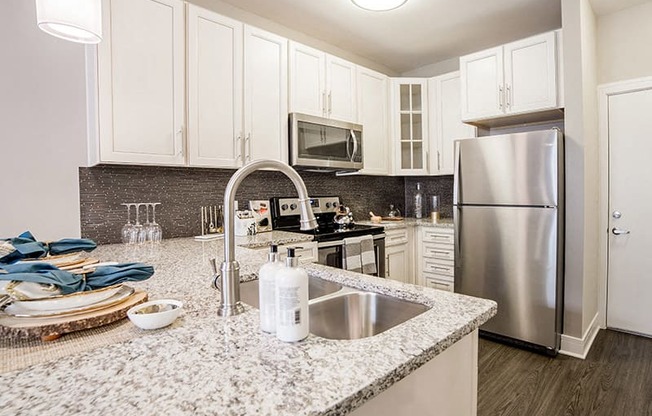 Marble Style Floorplan Kitchen at Quarry at River North