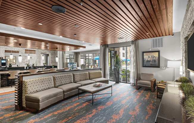 a lobby with couches and a coffee table