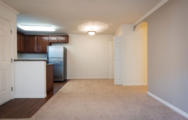 a kitchen and dining area in a 555 waverly unit