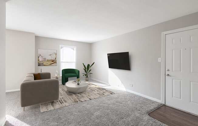 a living room with a couch and a table and a tv